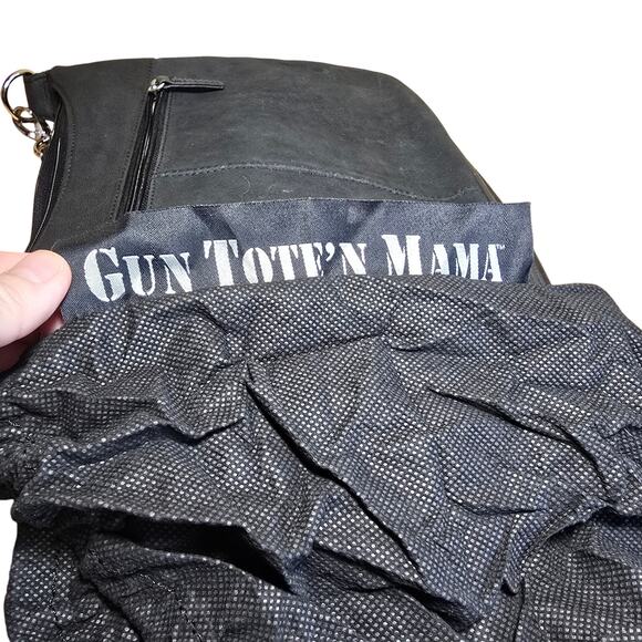New Gun Tote'N Mamas Concealed Carry Leather Hobo Handbag
12" Shoulder Strap - Picture 11 of 13